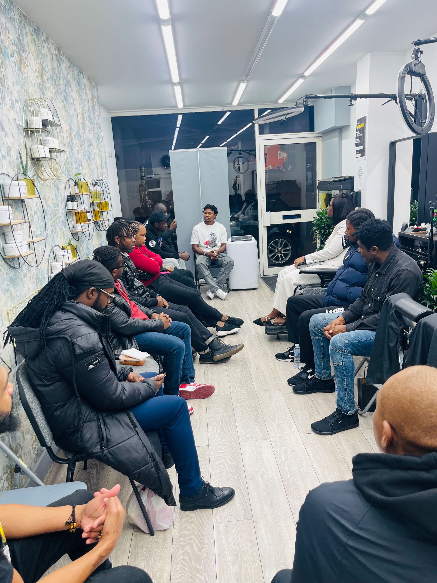 Jollof Nights™ community session inside the barbershop