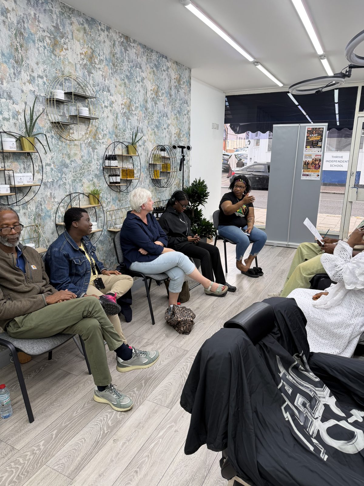 Parents and carers seated in a circle at A Place to Breathe